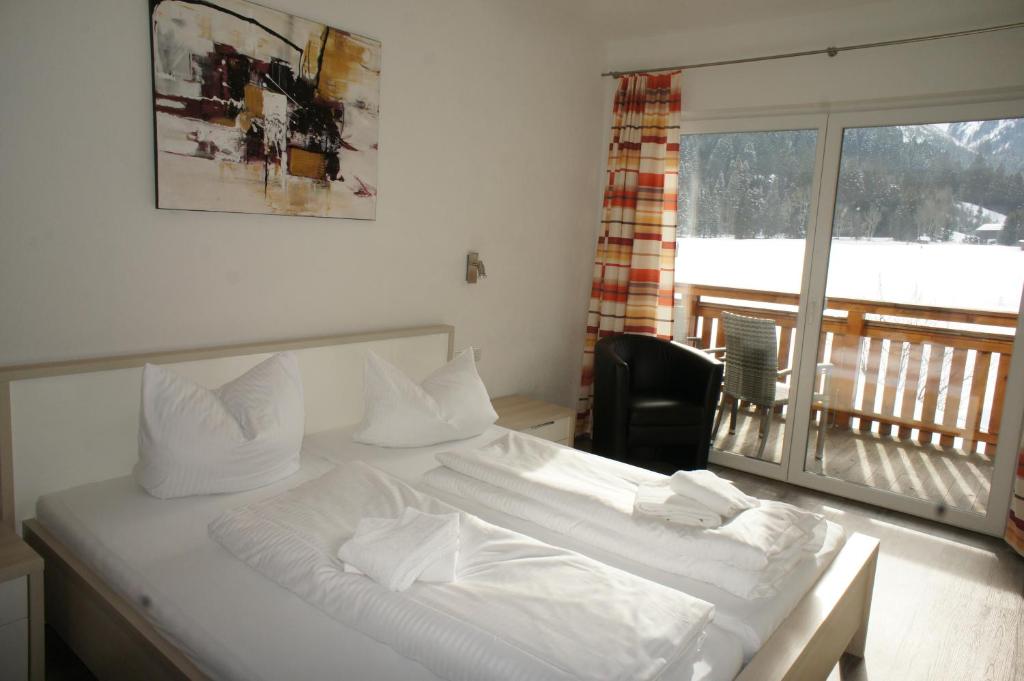 Posteľ alebo postele v izbe v ubytovaní Appartements Gärtner