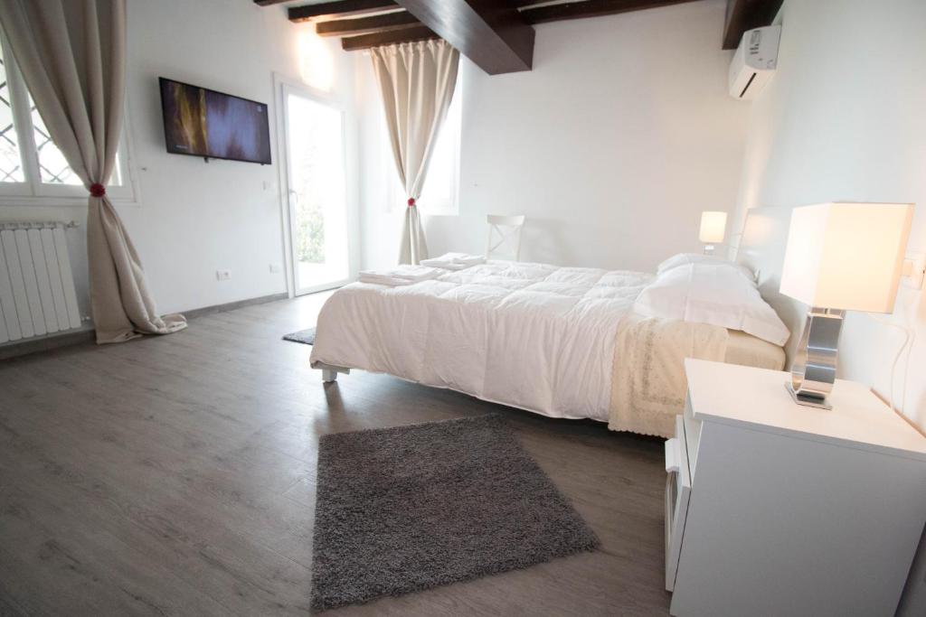 Postel nebo postele na pokoji v ubytování Country Resort Modena
