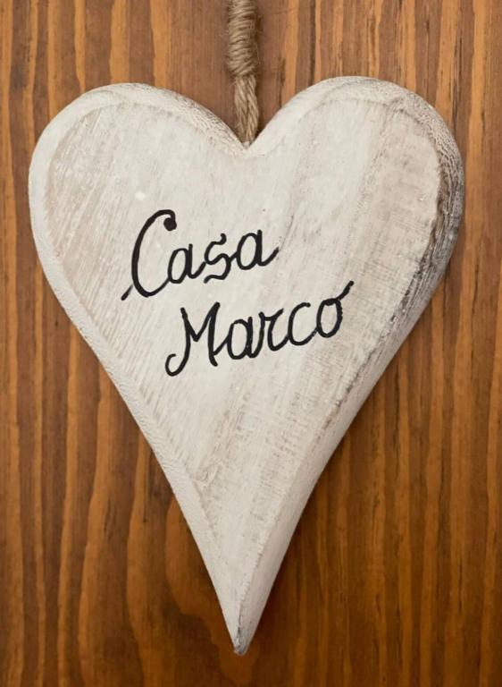 a wooden heart with the words casa moco at Casa Marco - Ca' di chi de Zirie - in Pelos