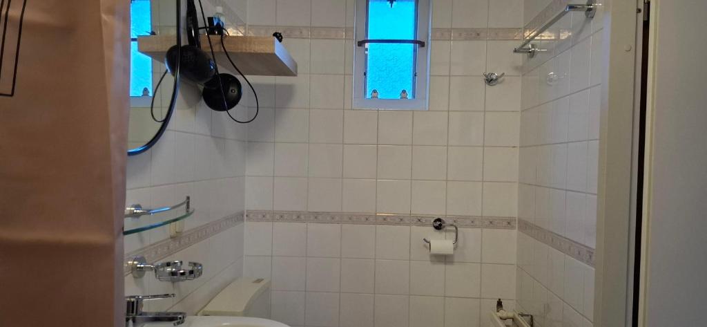 Koupelna v ubytování Vacation home Zwaantje #DKR2