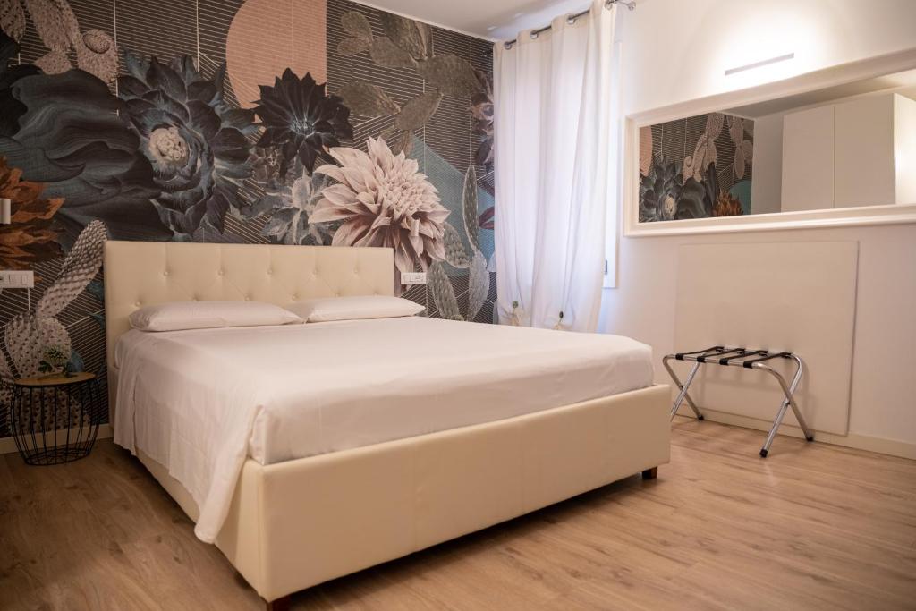 Postel nebo postele na pokoji v ubytování Hermes Venice