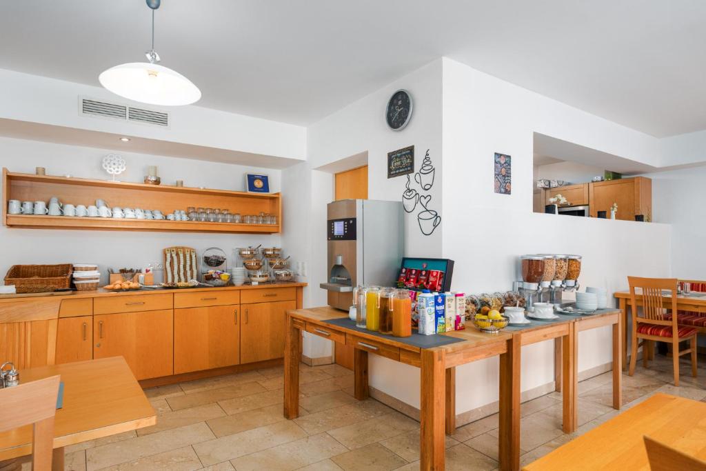 Kuchyň nebo kuchyňský kout v ubytování Hotel Laaxerhof
