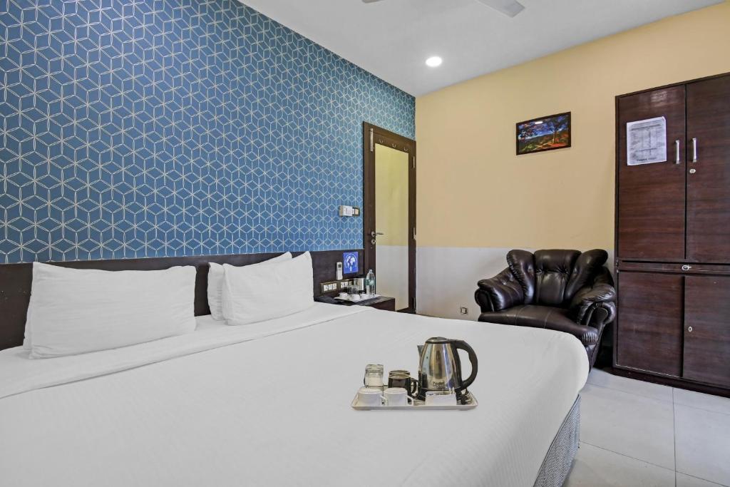 Postel nebo postele na pokoji v ubytování Super Townhouse The Platinum
