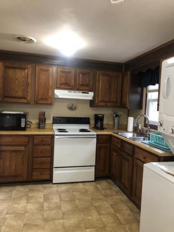 A cozinha ou kitchenette de Captain's Quarters