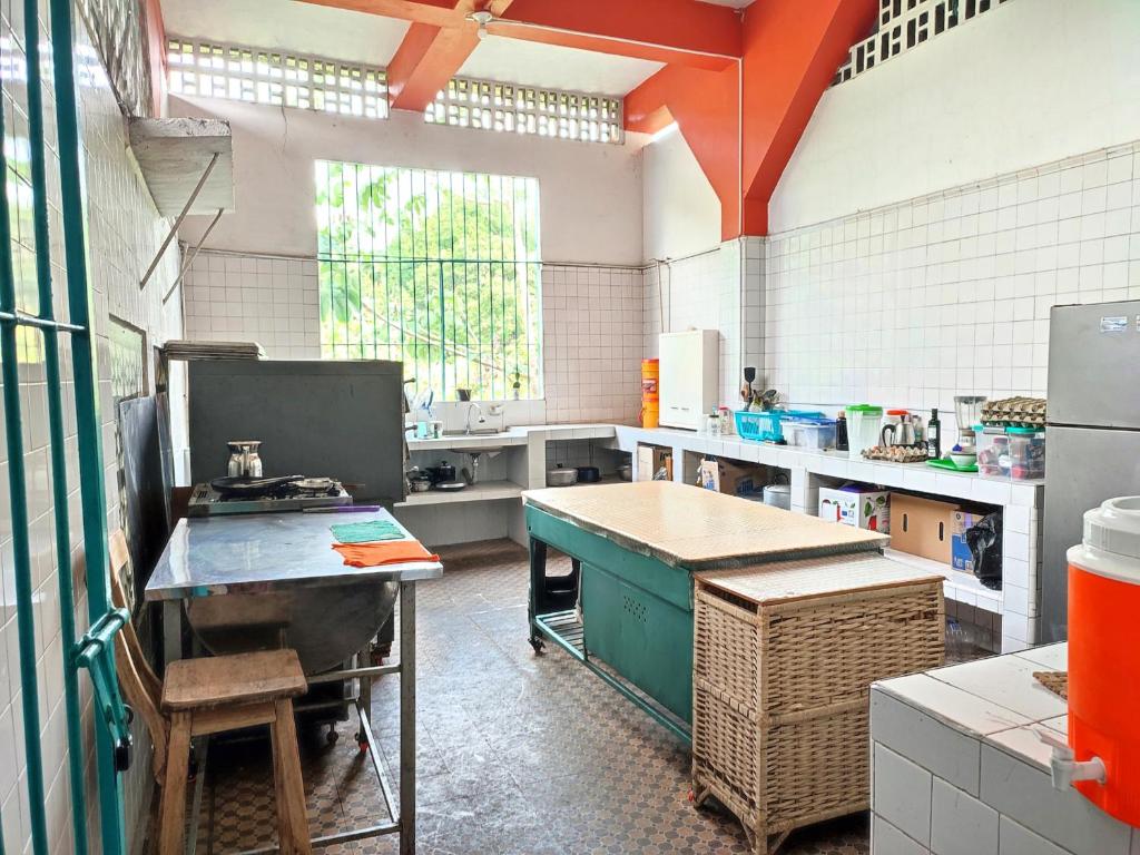 Kuchyň nebo kuchyňský kout v ubytování Hotel Kasa Dokari
