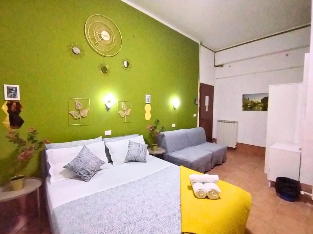 Postel nebo postele na pokoji v ubytování Pavarotti