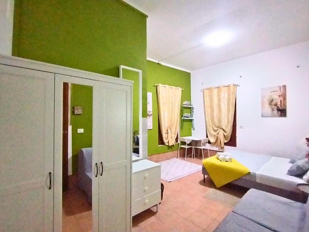 Postel nebo postele na pokoji v ubytování Pavarotti