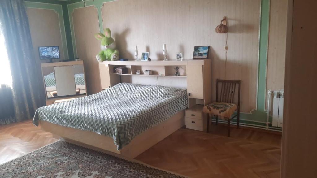 Postel nebo postele na pokoji v ubytování Дом гостевой Для семьи