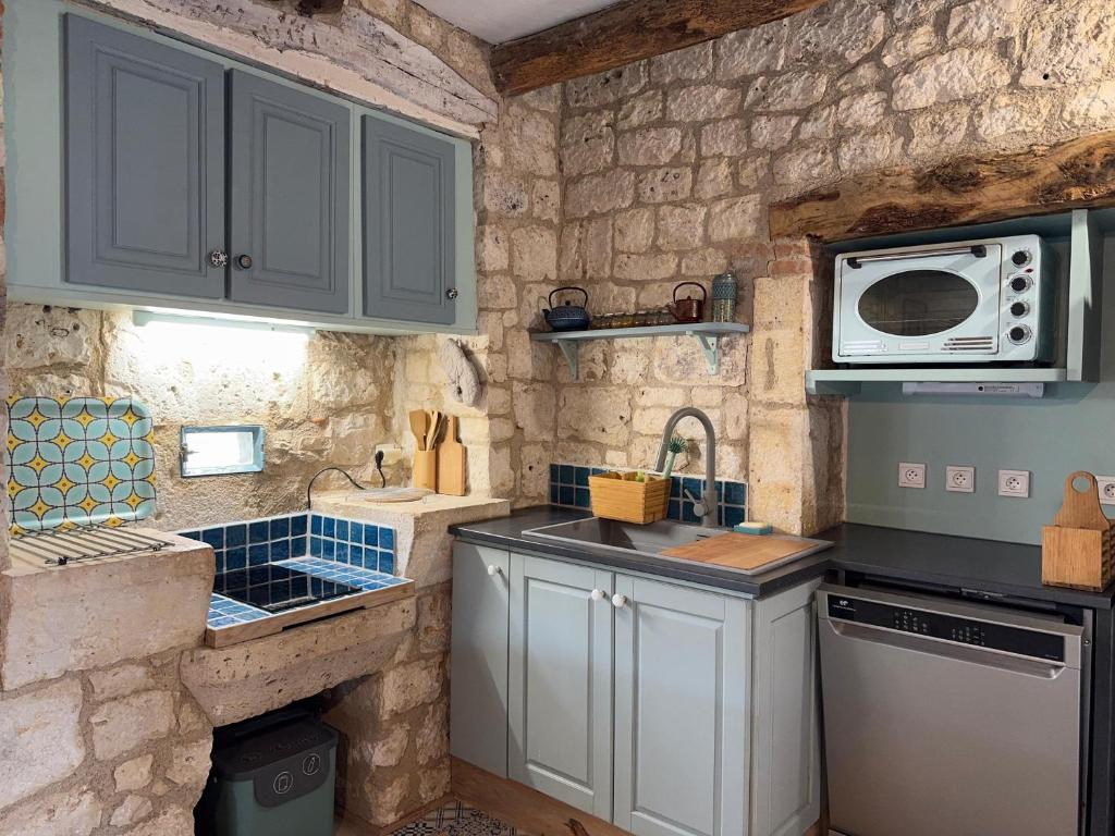 Köök või kööginurk majutusasutuses Gîte de charme champêtre