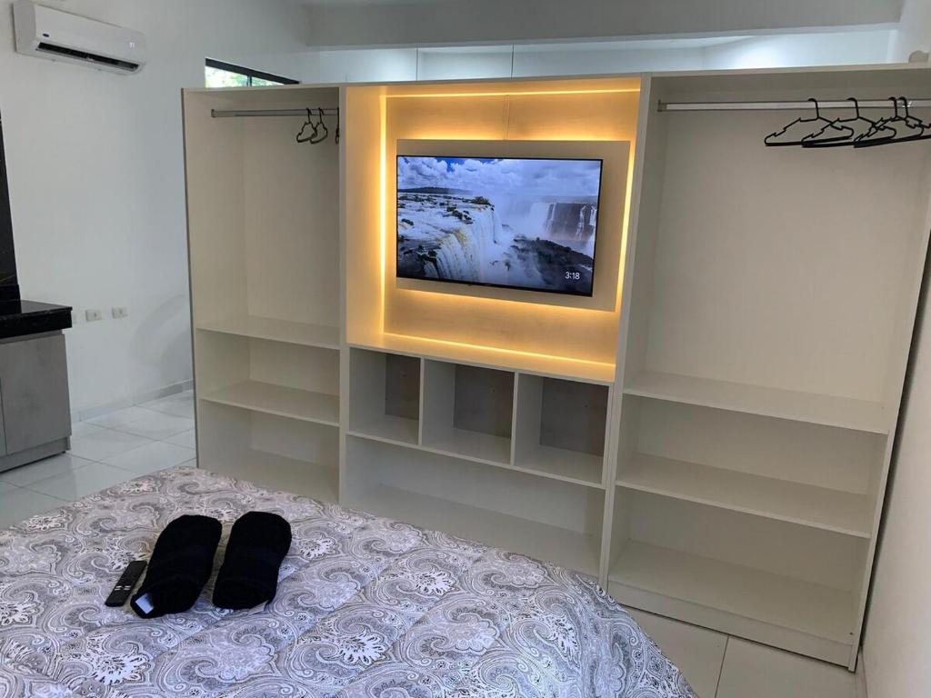 TV a/nebo společenská místnost v ubytování Casa y Monoambiente en Pilar, Py