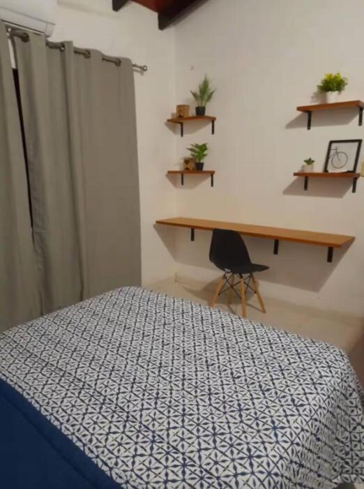 Postel nebo postele na pokoji v ubytování Casa y Monoambiente en Pilar, Py