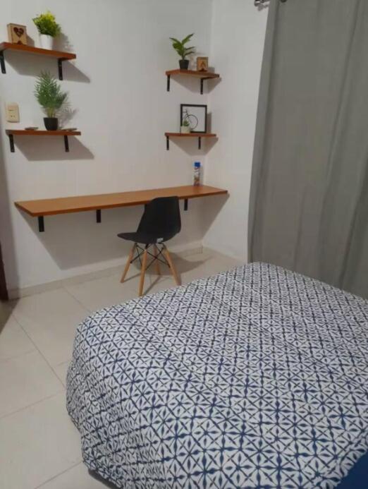 Postel nebo postele na pokoji v ubytování Casa y Monoambiente en Pilar, Py