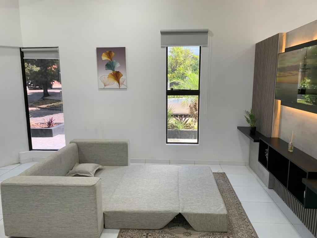 Posezení v ubytování Casa y Monoambiente en Pilar, Py