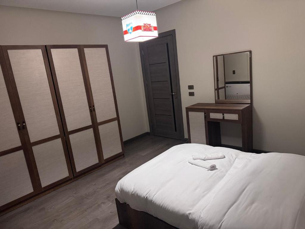 Katil atau katil-katil dalam bilik di Apartment in Dreamland