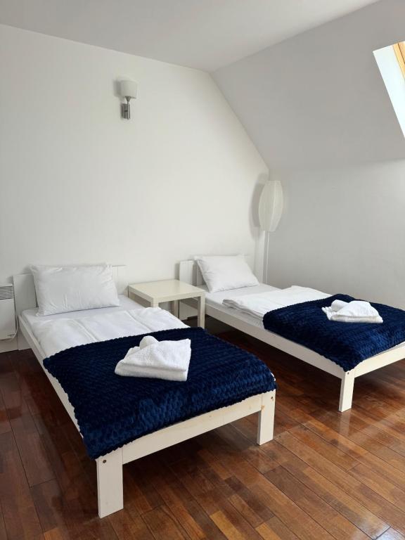 Postel nebo postele na pokoji v ubytování Apartamenty Baltic Sea Żeglarska 10 nr2