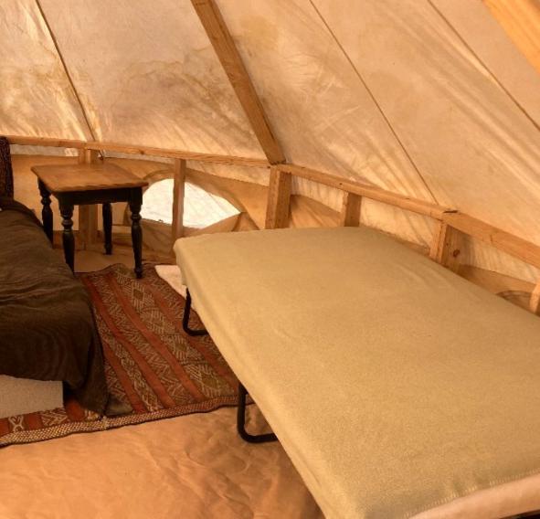 Postel nebo postele na pokoji v ubytování TeePee at Mojave