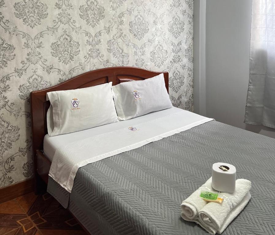 Postel nebo postele na pokoji v ubytování Hostal