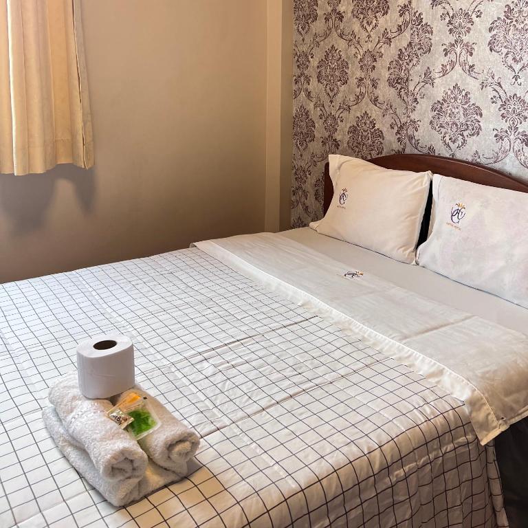 Postel nebo postele na pokoji v ubytování Hostal