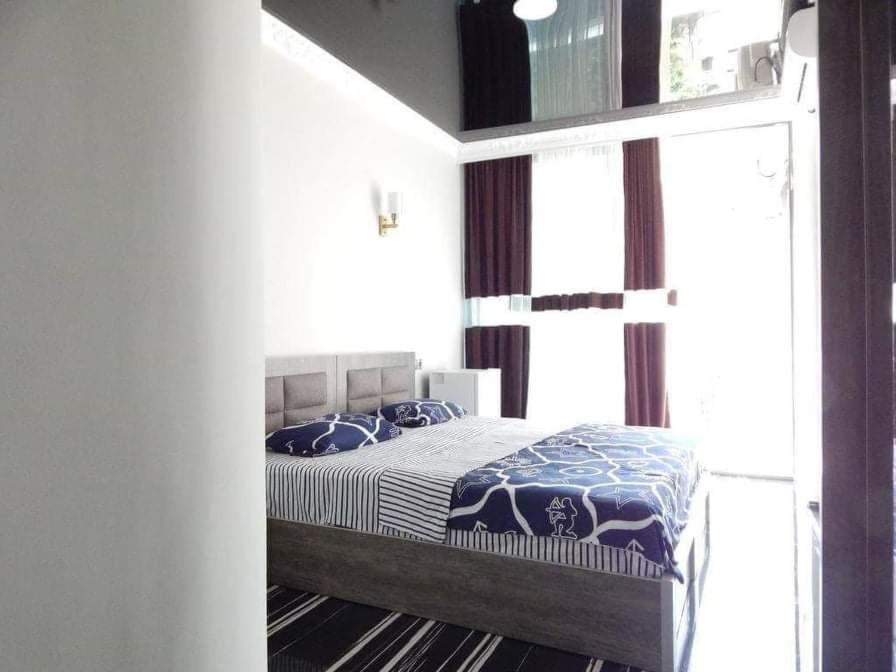 Postel nebo postele na pokoji v ubytování Guesthouse Agmashenebeli Sea side