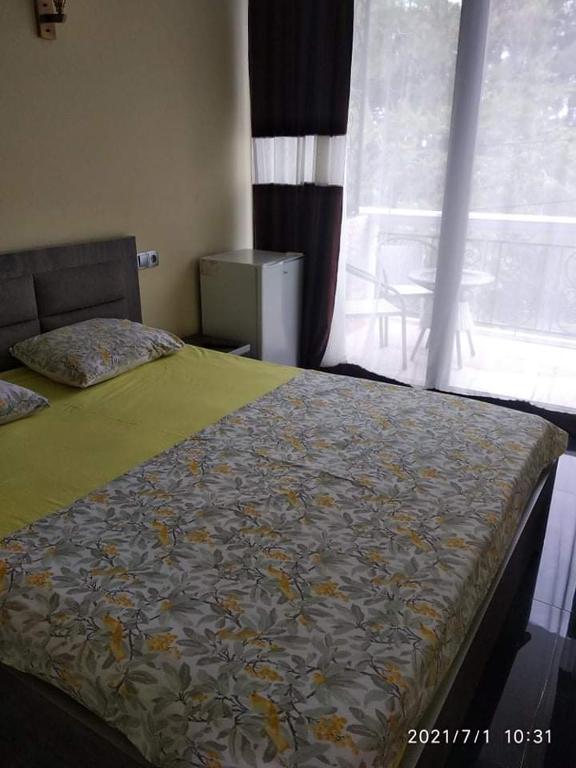 Postel nebo postele na pokoji v ubytování Guesthouse Agmashenebeli Sea side
