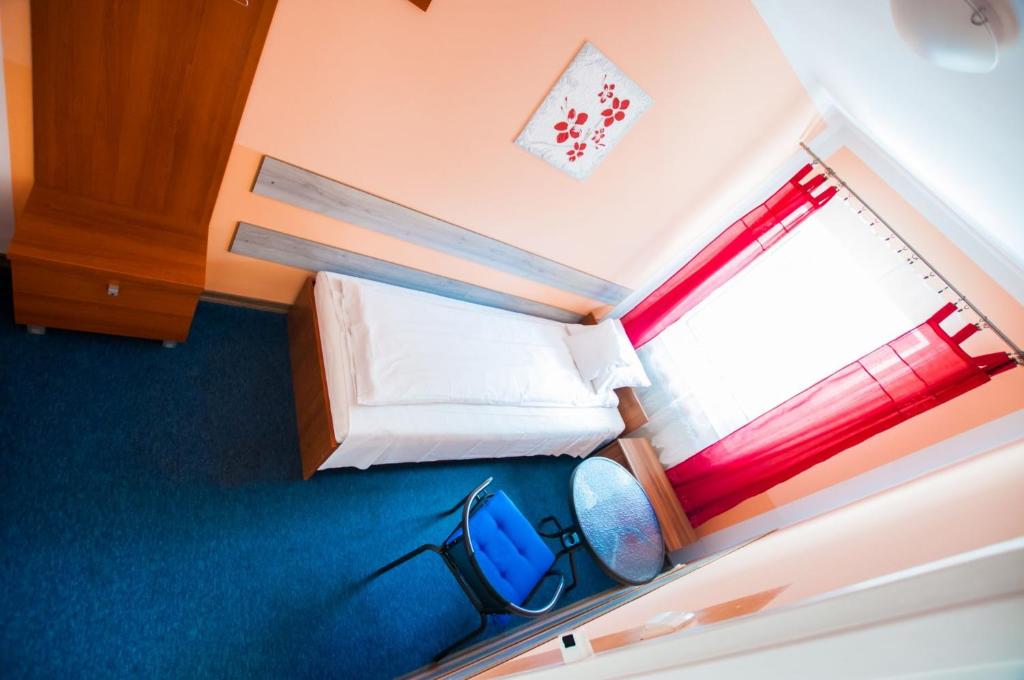 Posteľ alebo postele v izbe v ubytovaní Red Carpet Hostel