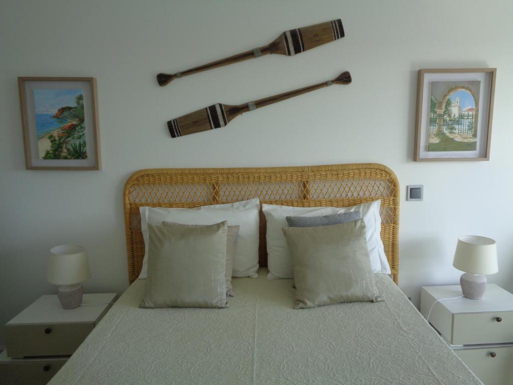 Postel nebo postele na pokoji v ubytování Suites da Ria