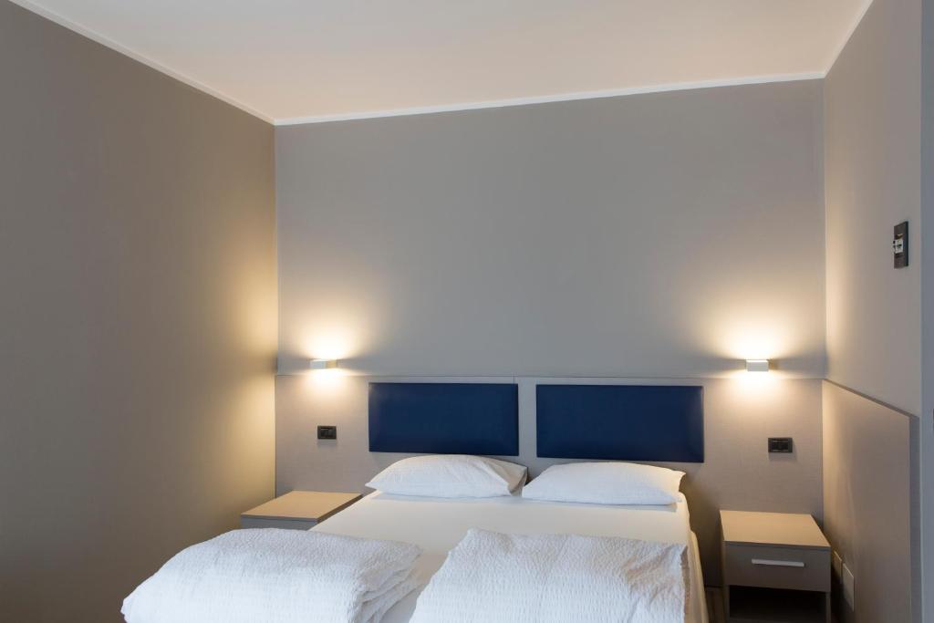 Postel nebo postele na pokoji v ubytování Albergo Montenegro