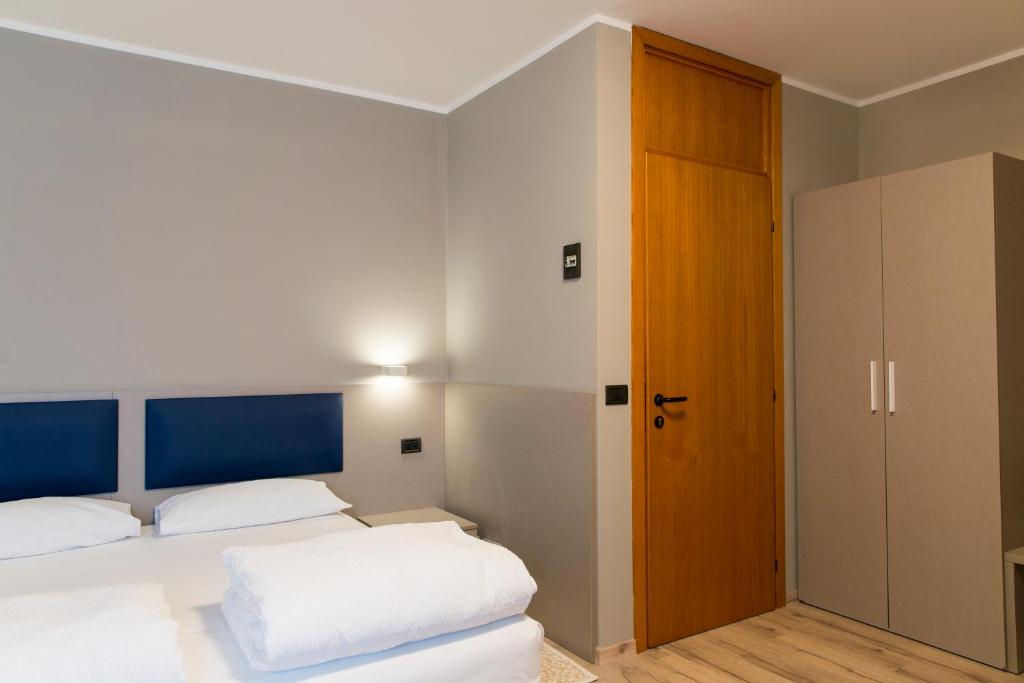 Postel nebo postele na pokoji v ubytování Albergo Montenegro