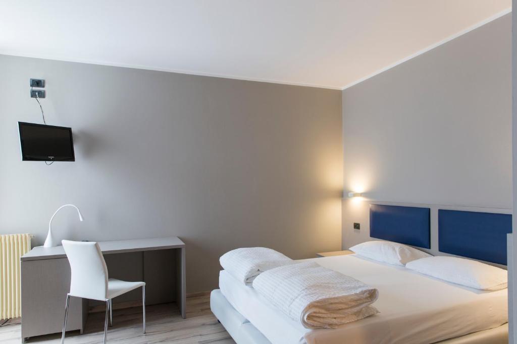 Postel nebo postele na pokoji v ubytování Albergo Montenegro