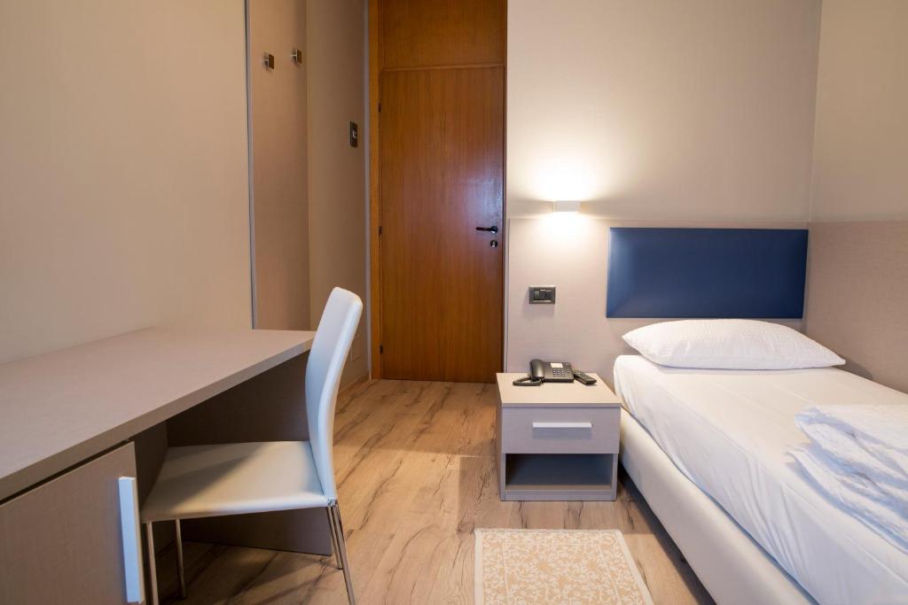 Postel nebo postele na pokoji v ubytování Albergo Montenegro