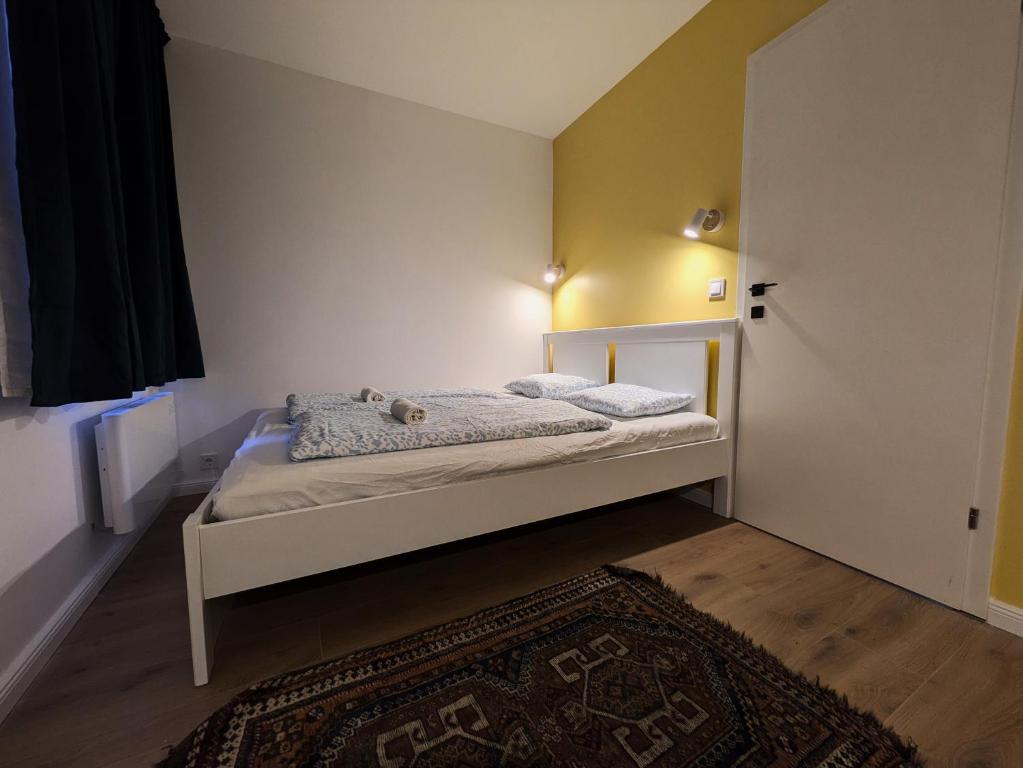 Postel nebo postele na pokoji v ubytování mg4 Apartments