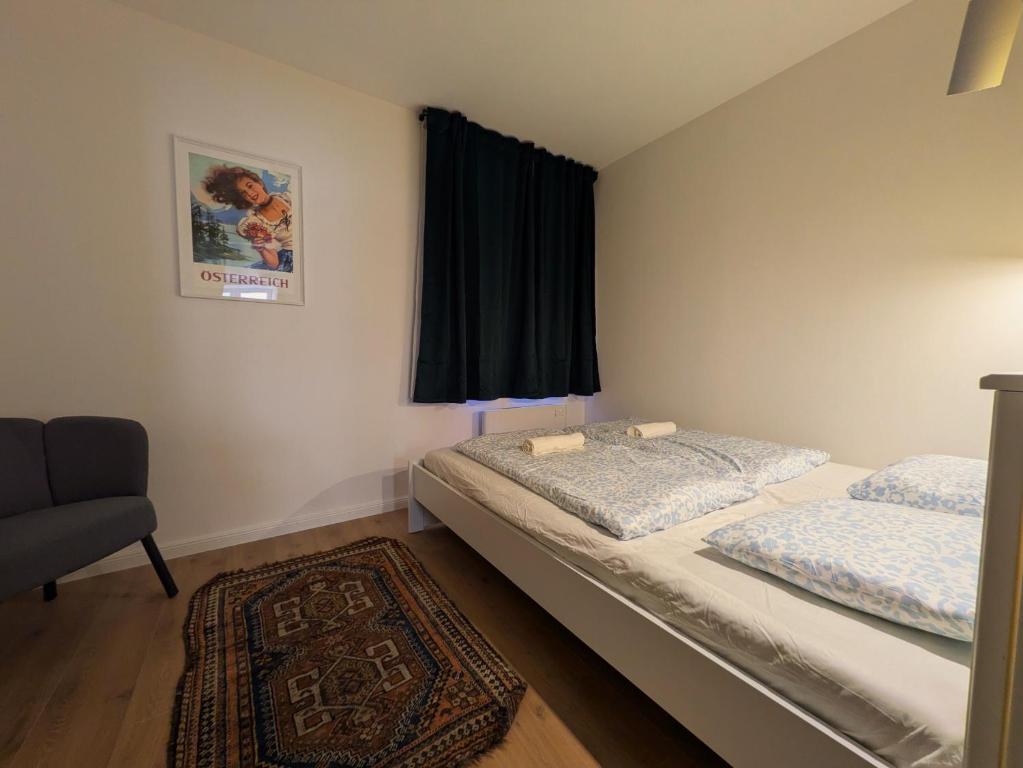 Postel nebo postele na pokoji v ubytování mg4 Apartments