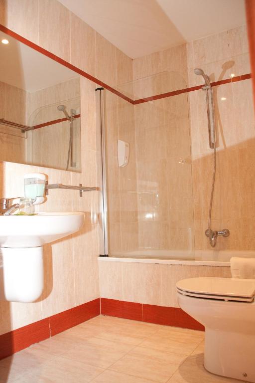 Kúpeľňa v ubytovaní Hotel Cuéntame