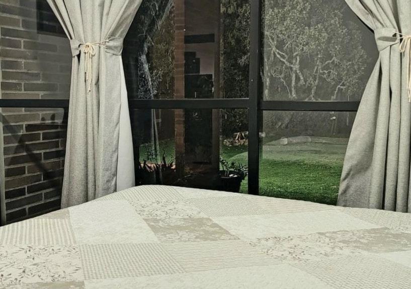 Postel nebo postele na pokoji v ubytování Nordika House - ideal para fotografía y descanso