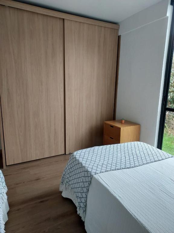 Postel nebo postele na pokoji v ubytování Nordika House - ideal para fotografía y descanso