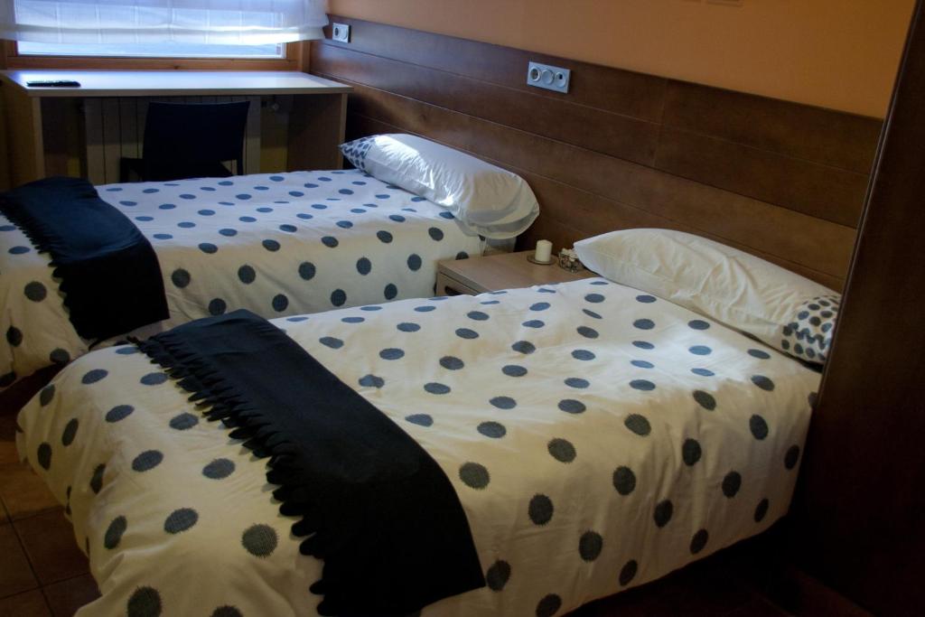 Posteľ alebo postele v izbe v ubytovaní Hotel Cuéntame