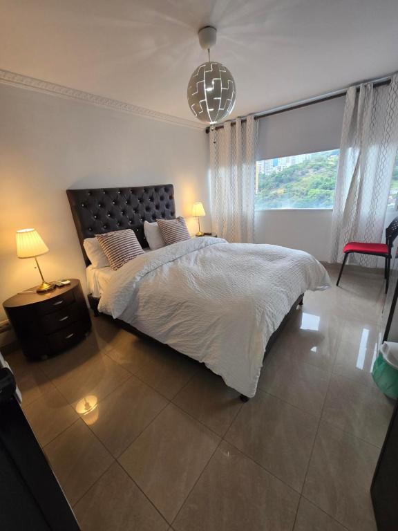 Ένα ή περισσότερα κρεβάτια σε δωμάτιο στο Penthouse