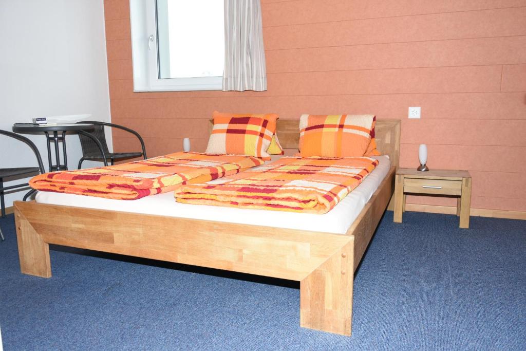 Postel nebo postele na pokoji v ubytování Towerhotel