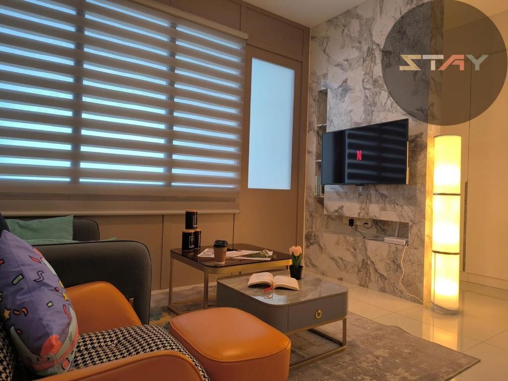 Μια τηλεόραση ή/και κέντρο ψυχαγωγίας στο Teega Modern 4Pax Pool N Seaview Netflix BySTAY