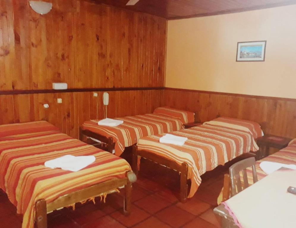 Postel nebo postele na pokoji v ubytování Hosteria Los Helechos