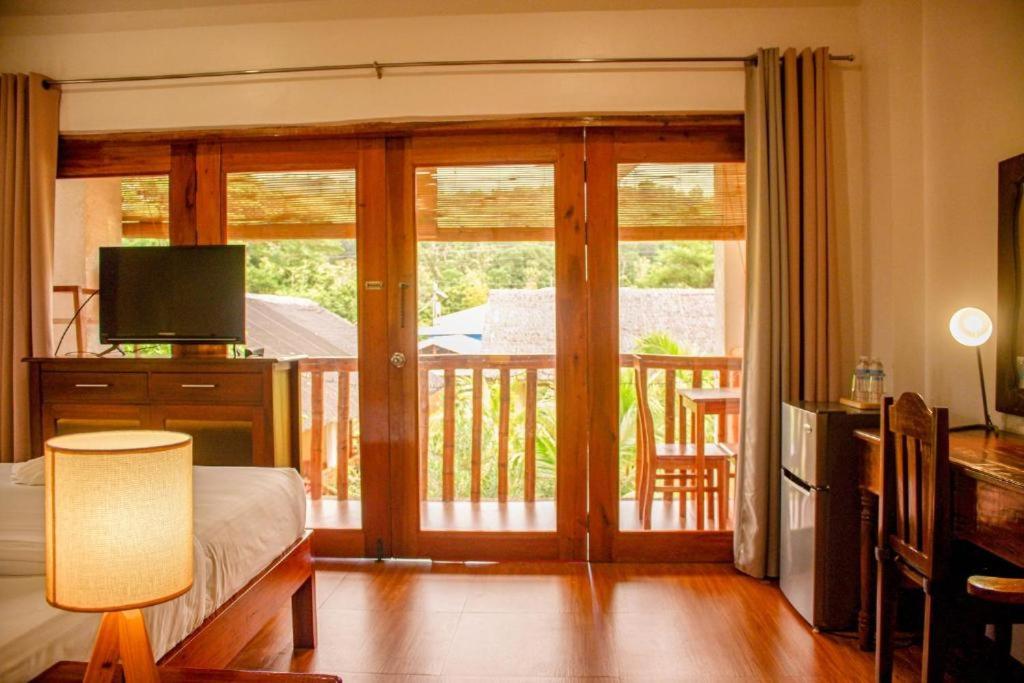 TV a/nebo společenská místnost v ubytování Wilcon Guesthouse Catulayan