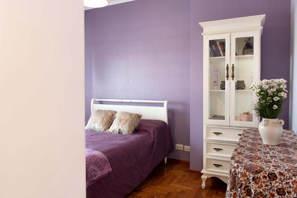 Una cama o camas en una habitación de Relax Tango BA - San Telmo