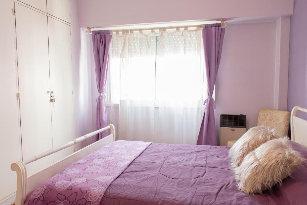 Una cama o camas en una habitación de Relax Tango BA - San Telmo