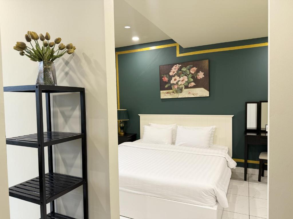 Giường trong phòng chung tại La Casona Hotel