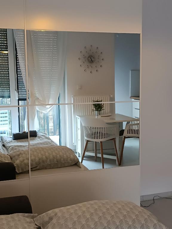 Postel nebo postele na pokoji v ubytování Silver apartman