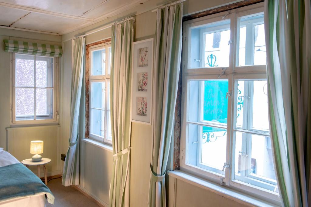 Postel nebo postele na pokoji v ubytování Haus im Zitronengässele