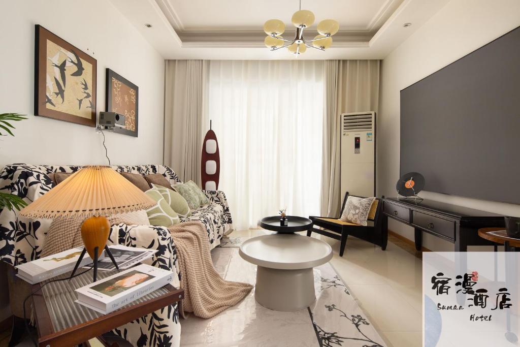 Posezení v ubytování Su Man Designer River View Hotel宿漫设计师江景酒店重庆洪崖洞店