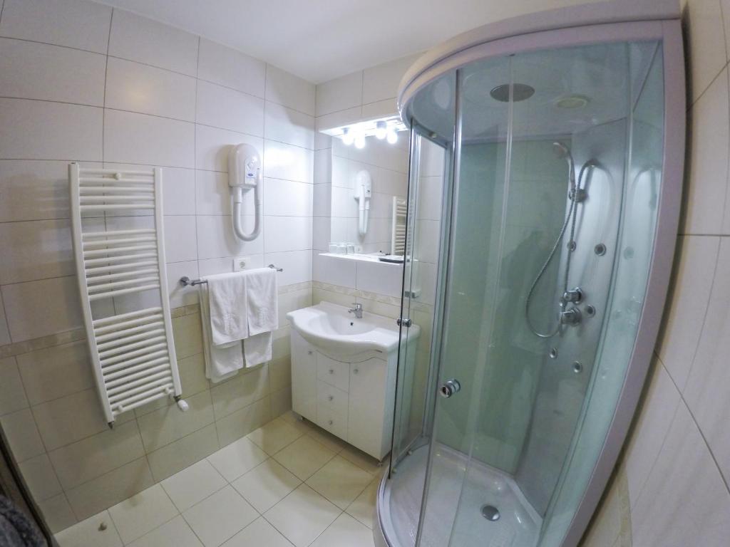 Koupelna v ubytování Hotel Hermes