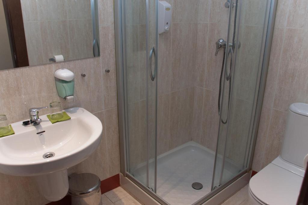 Kúpeľňa v ubytovaní Hotel Cuéntame