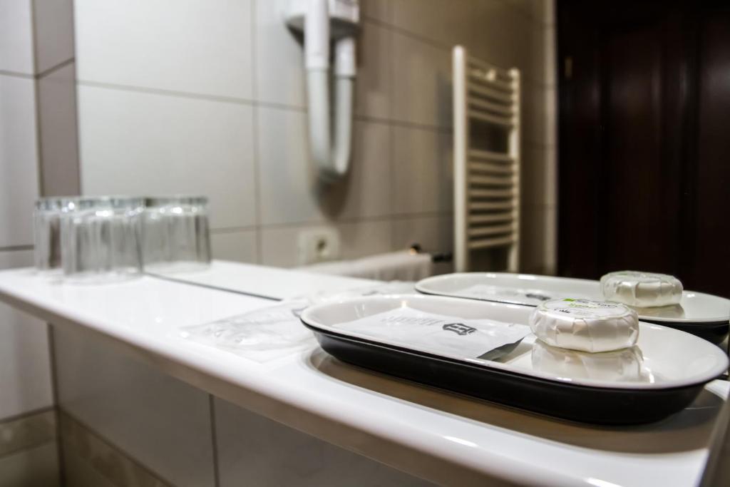 Koupelna v ubytování Hotel Hermes